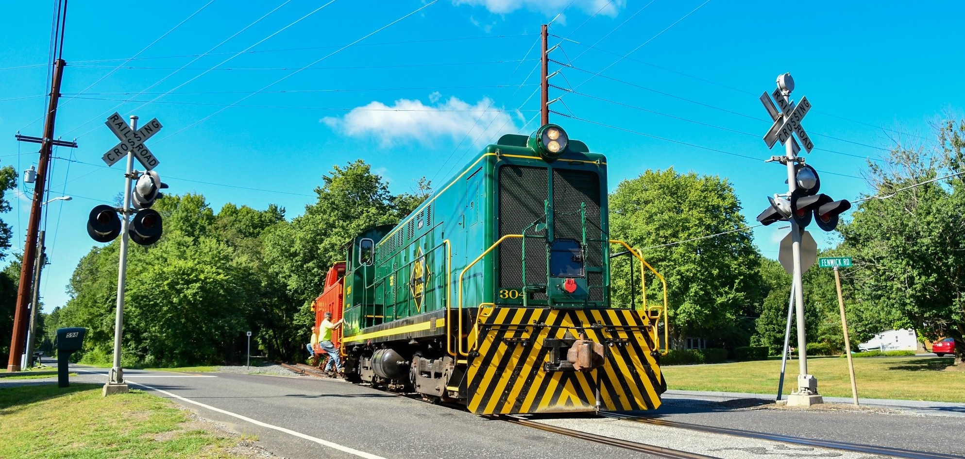  A picture of the Woodstown Central Railroad at railroad crossing.